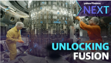 Two men work inside the D3-D tokamak. Text on the image says "Yahoo! Finance Next" and "Unlocking Fusion"